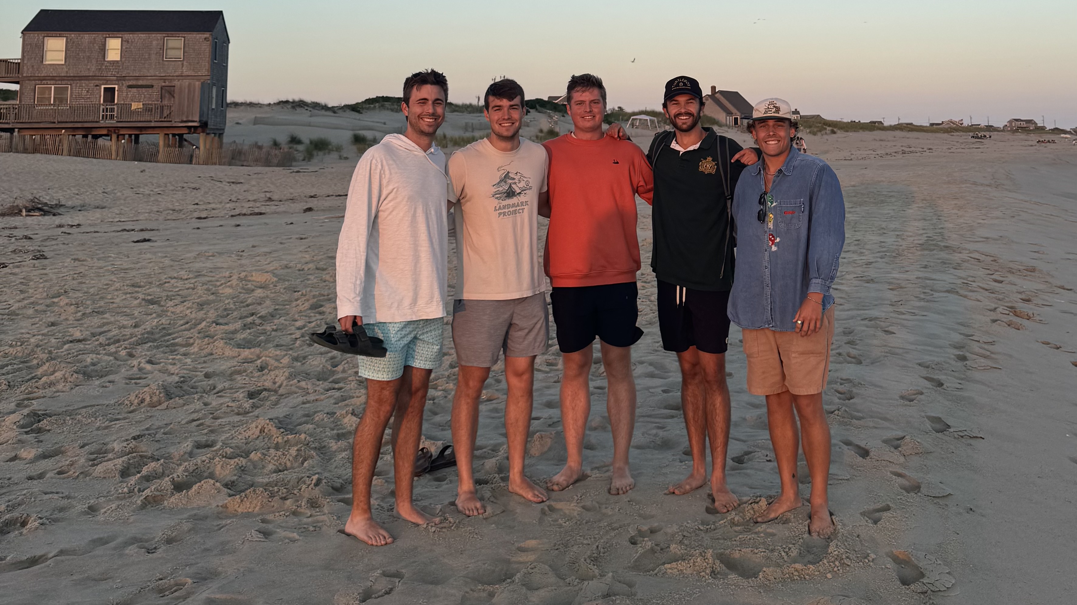 Justin with friends on the beach