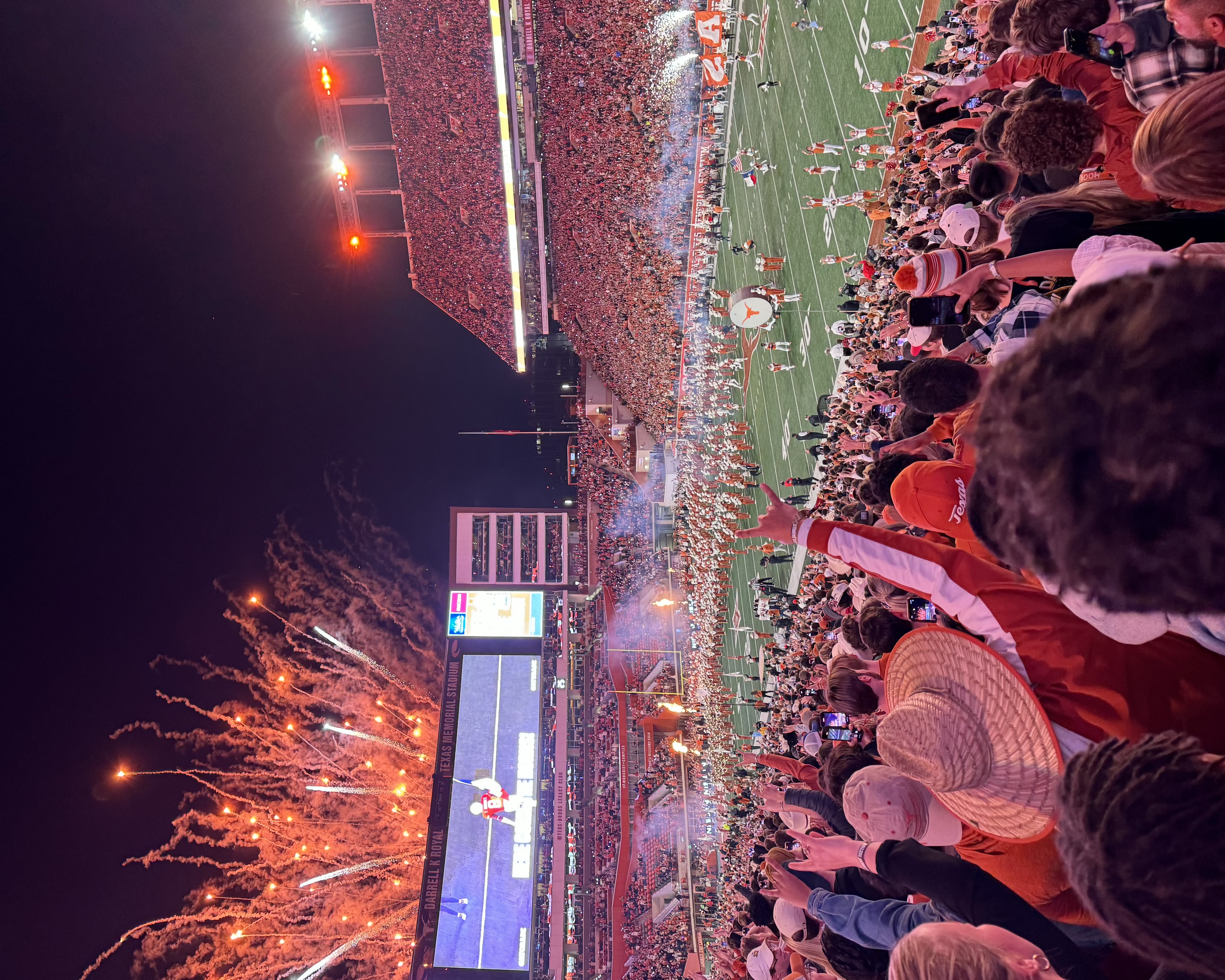 University of Texas football stadium during a game with fireworks